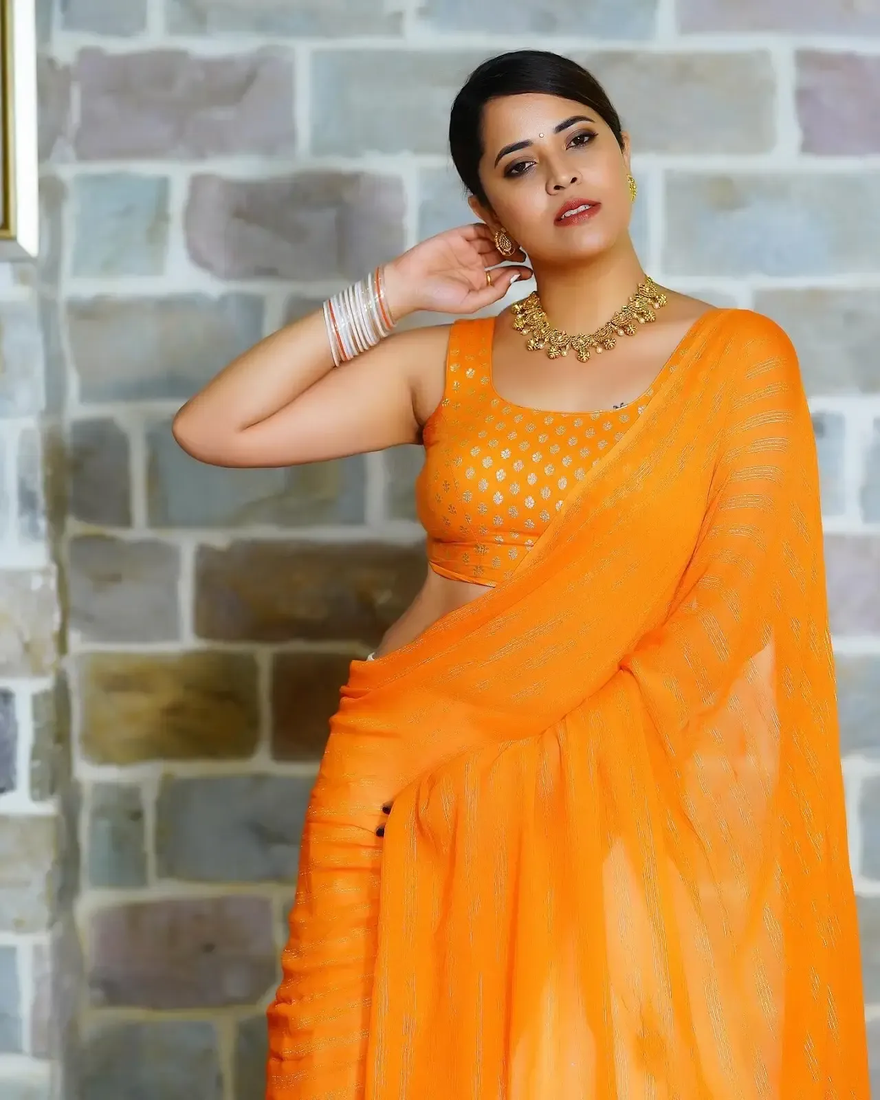 INDIAN ACTRESS ANASUYA BHARADWAJ IMAGES IN YELLOW LEHENGA CHOLI 5